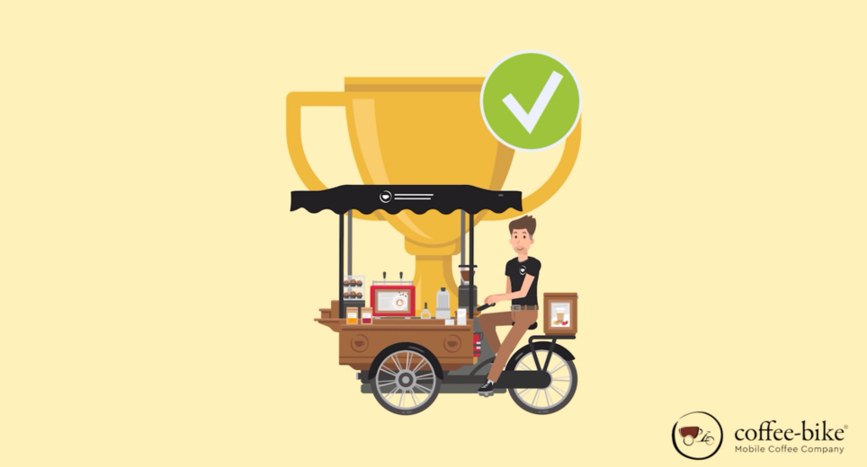 An illustrative picture of a Coffee-Bike franchise where a franchise partner is sitting on the bike and behind him is a trophy due to his success.