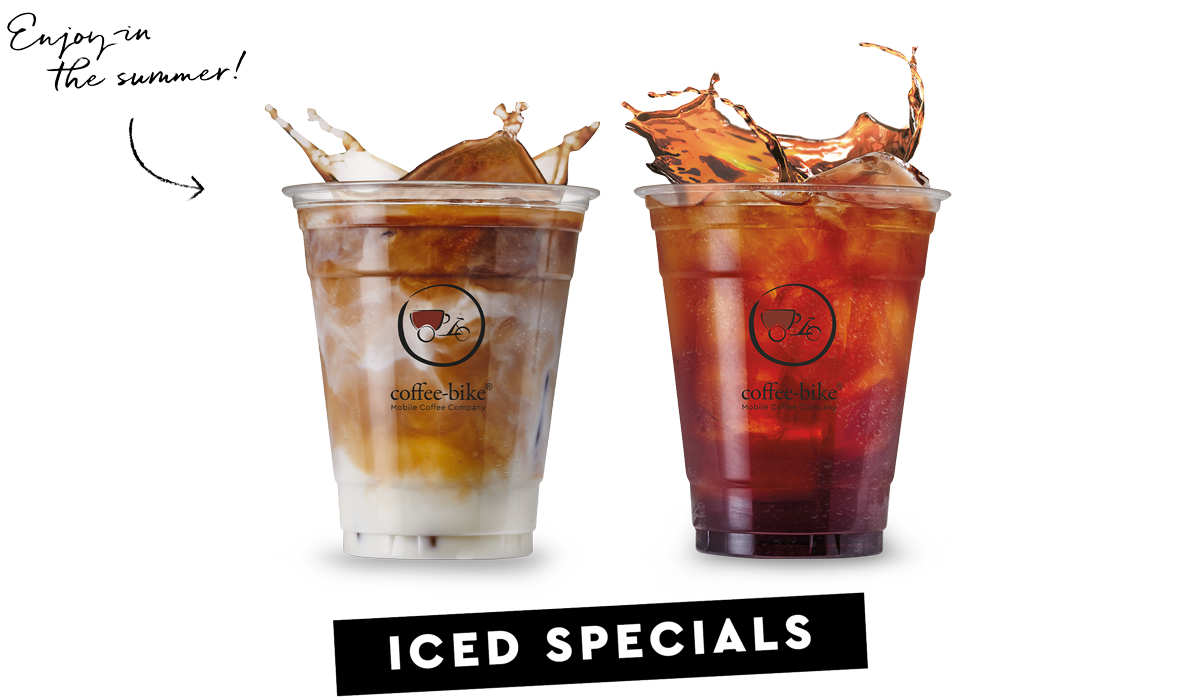 Iced latte and red iced tea in two cups side by side with splashing contents
